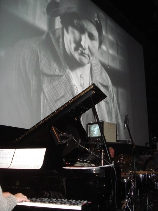 Live performance with piano and film projection